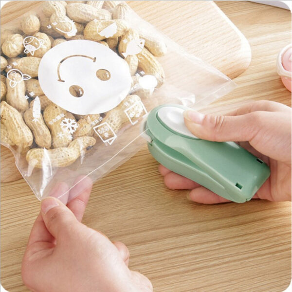 اله تغليف الطعام و اكياس الطعام Mini Portable Food Storage Bag Sealing Machine - Image 6